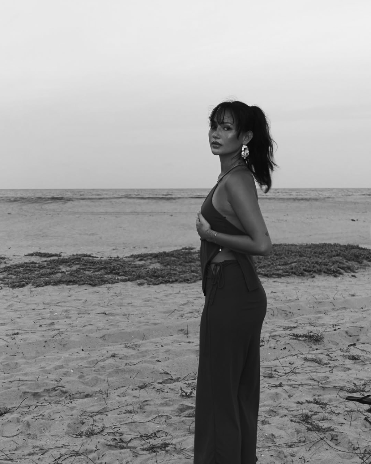 Image of Ashley Vong at beach looking at the camera